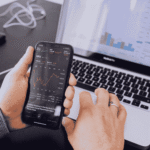 Smartphone and laptop displaying analytics dashboards representing zero click AI answers and the evolution of digital marketing.